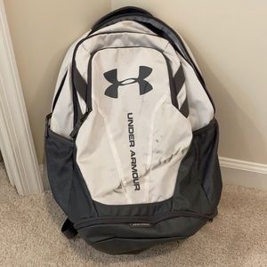 Grey and white under armpit backpack